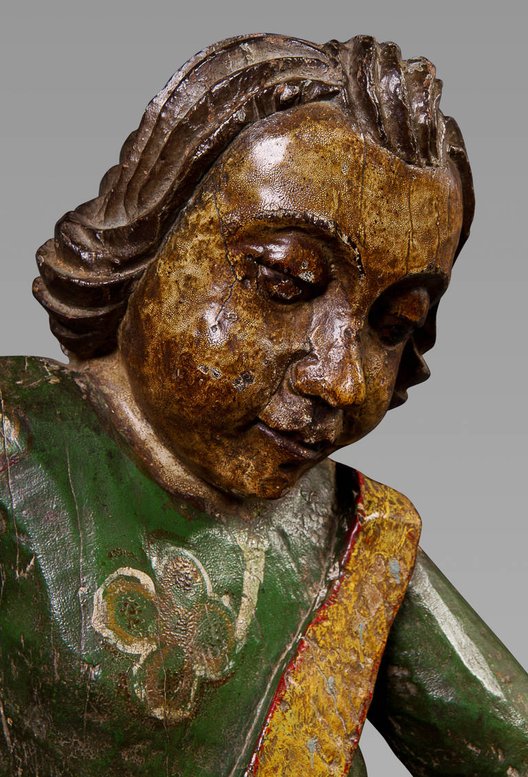 Folk Art Delightful 17th Century Spanish Polychrome Carving of a Child For Sale