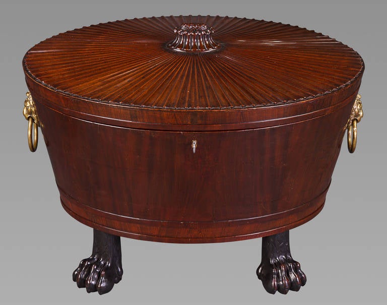 Cellarets, or wine coolers, of this design are of complexity that only the most accomplished cabinet makers could have produced them, and the firm of Gillows is known to have produced similar examples. Of particular distinction with this piece is