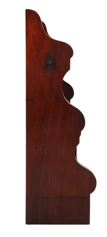 Of waterfall shape these well designed shelves are crafted in excellent quality mahogany.