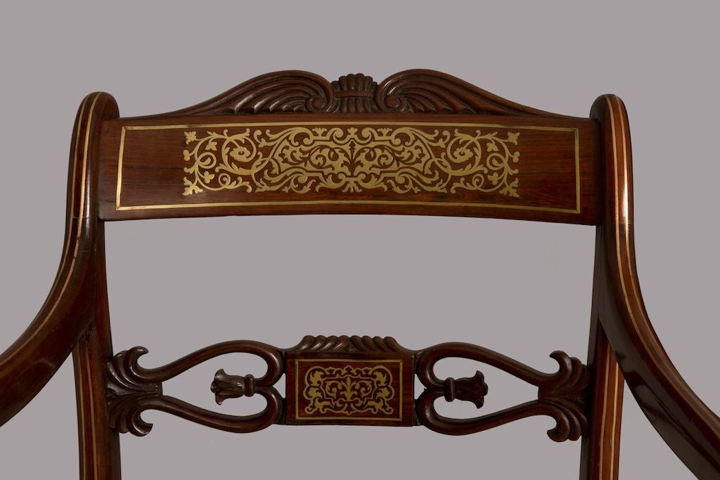 A Set of Eight Regency Brass-Inlaid Rosewood Dining Chairs