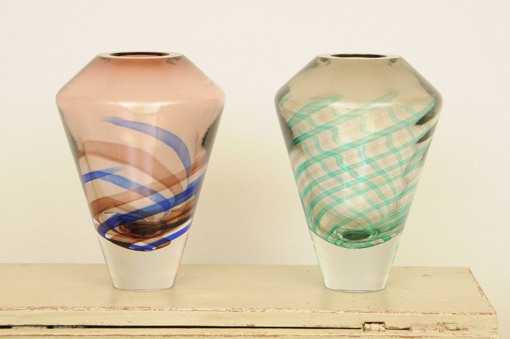 Pair of Mid century Murano glass vases with delicate spiral design one in green and grey and the other in blue and smoked violet tones.
Signed Salviati on bottom.

H: 13