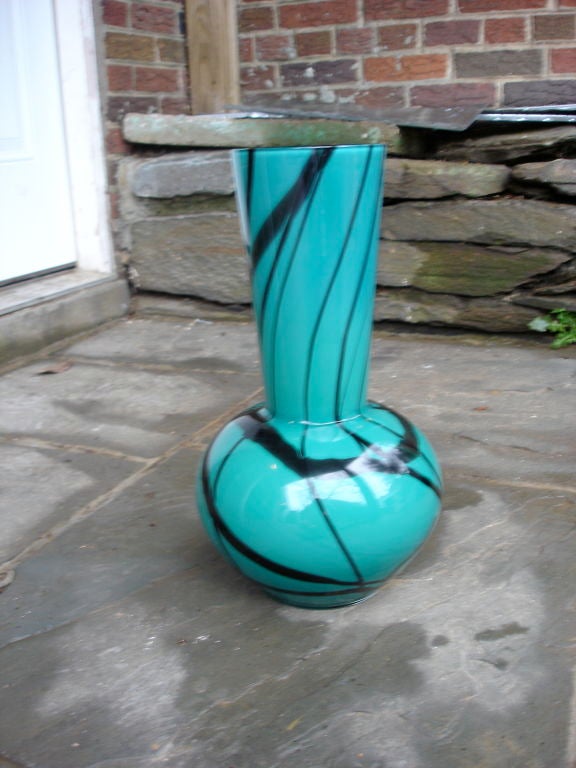 Handblown Murano Glass vase in an abstract design from the factory of Salviati. circa, 1960s
Has the original Salviati label with the ticket number 10189
