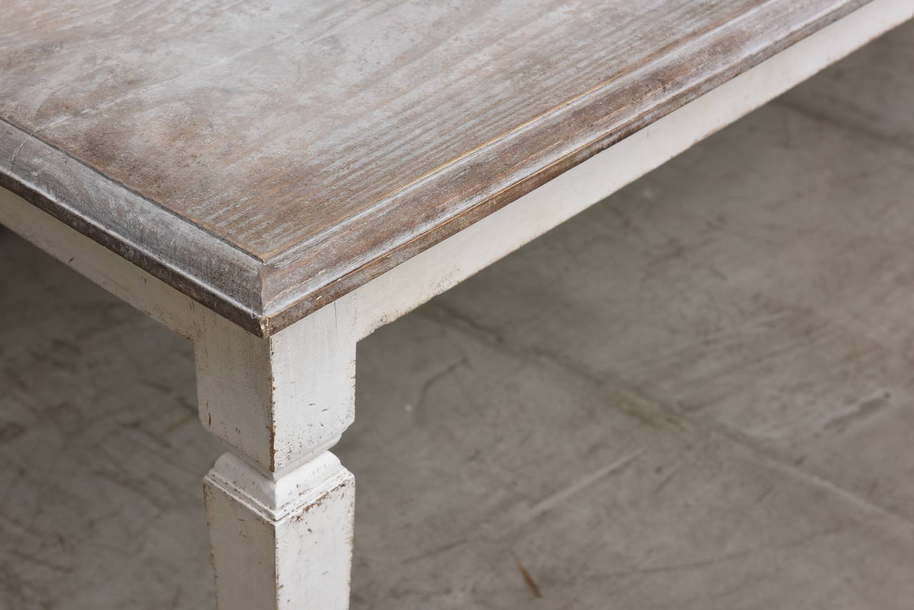 Beautiful Antique Swedish Dining Farm Table with four elegant tapered legs; table top is stressed greyish and apron and legs are whitewashed.  Tabletop has been scraped down to original painted colour.