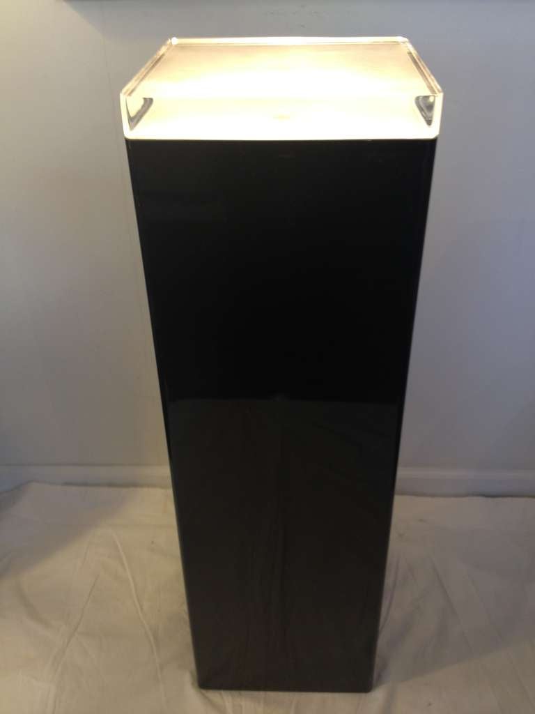 All original Black Plexiglass and thick Lucite top lighted Pedestal