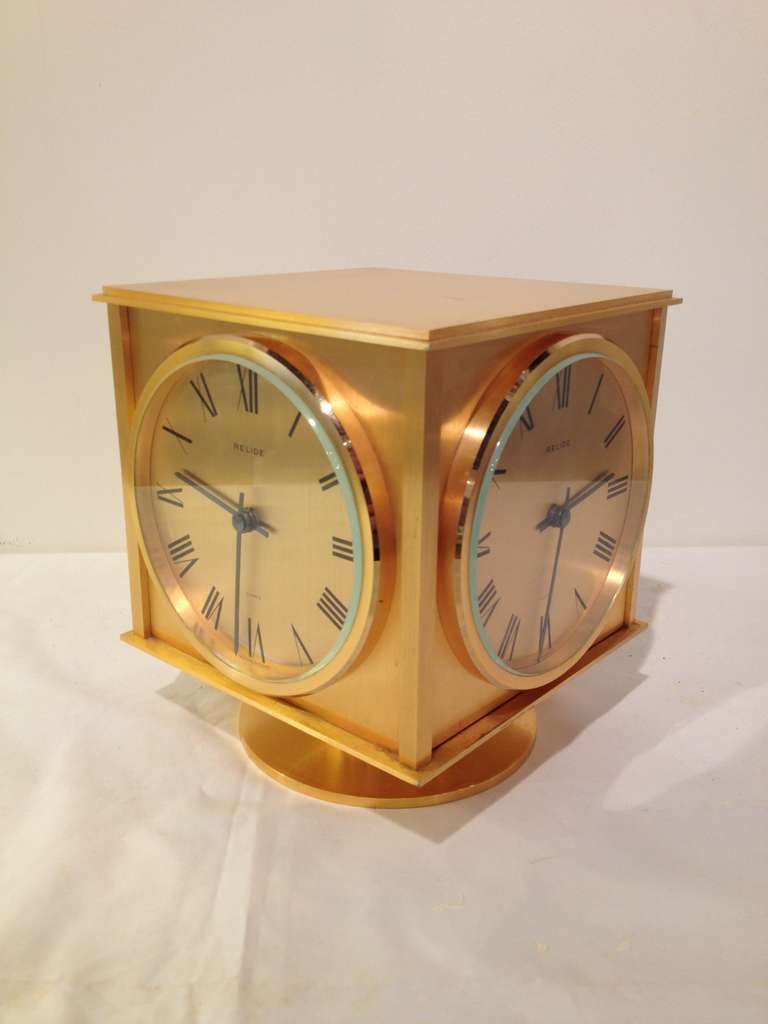 French Relide co  Gilt ,four sided,four time zone Quartz battery operated all original beveled glass Clock Rare ,One side clock open like a door to change battery and set times,heavy and well top quality