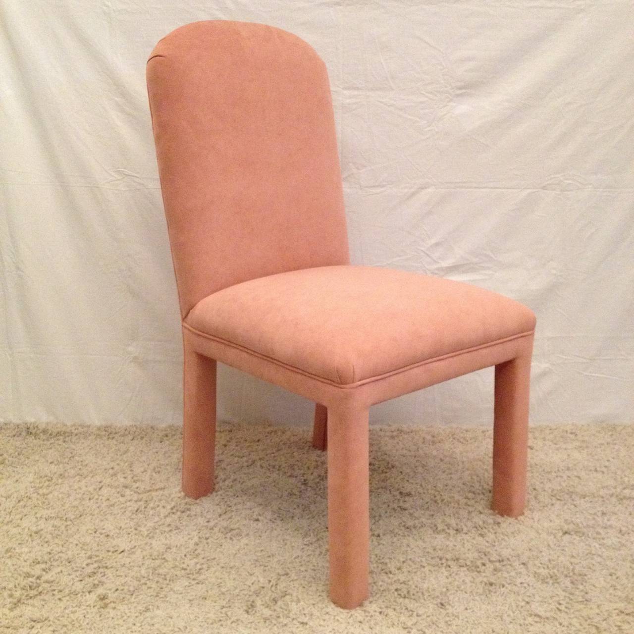 Vintage set of six dining chairs -suede soft coral upholstery, with a pleated simple back design all original. Matches a fossil stone dining table in separate listing..