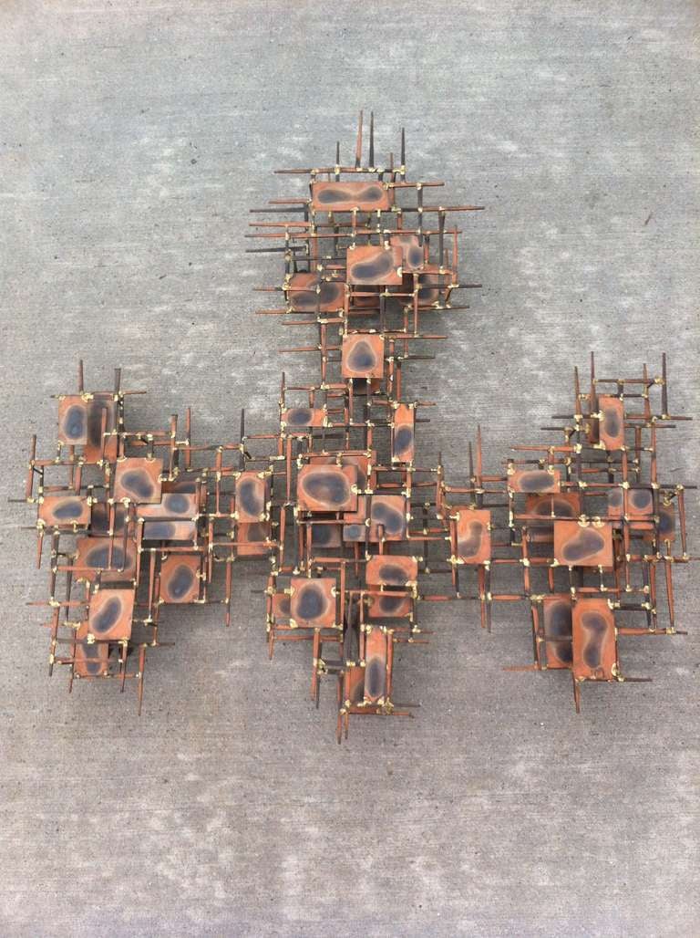 brutalist metal wall sculpture