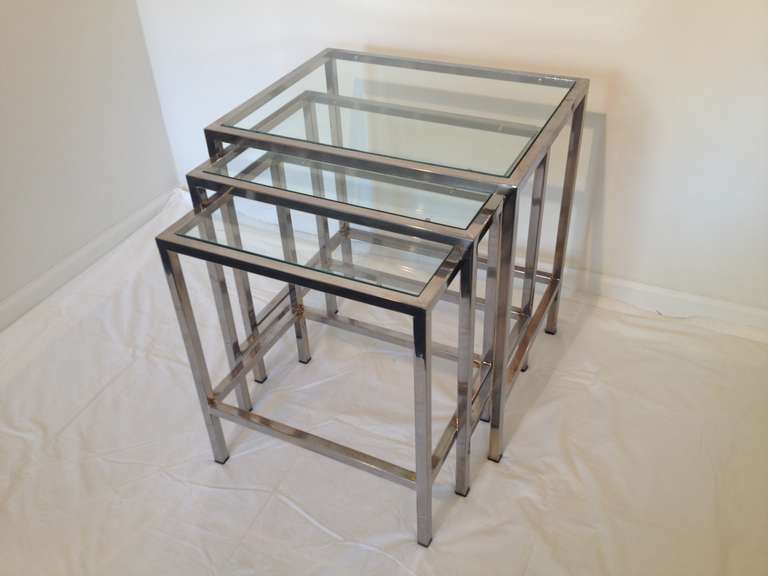 Set of Three 1950's Glass top polished Chrome Nesting Tables,some pitting to finish But great looking and period Style Milo Baughman.

Measurements large table 21.75x17x 23 high
19.75x15x21.75high
17.75x13x20.25 high