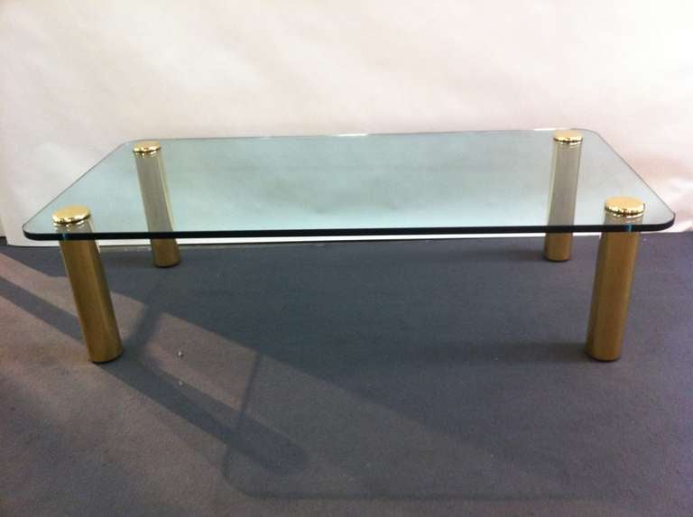 Circa 1970's glass top solid Brass Pace cocktail table.simple and elegant design