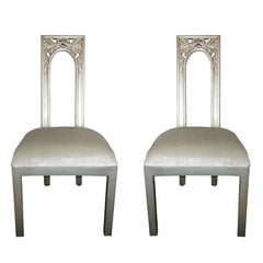 Ein Paar James Mont-Stühle