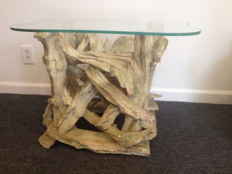 Pair Driftwood Gesso washed End tables all original with original free-form Glass very sturdy and extremely well constructed circa 1940,creme colored with some slight green Grey patina.
the measurements of base without glass is 24 wide 19 deep and