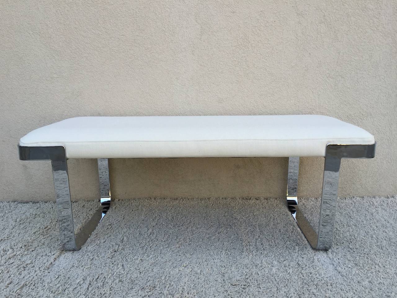 Milo Baughman polished chrome and off white weaved fabric bench.