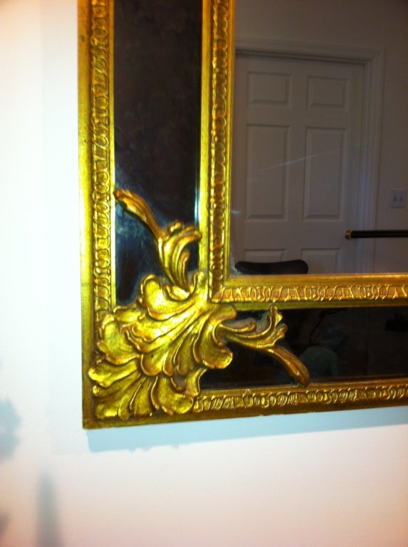 American Hollywood Regency Large Gold Leaf Charcoal Black Glass Mirror For Sale