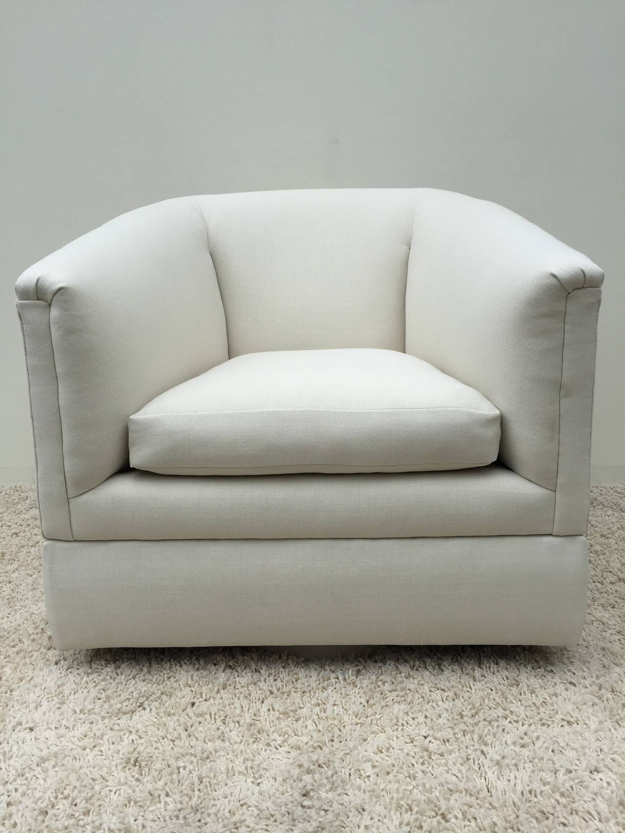 Pair Milo Baughman off white weaved fabric Swivel Chairs.