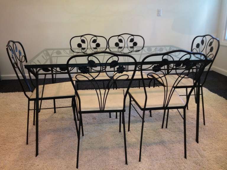 Table with six Chair Hand wrought Iron Glass top Patio set ,with original Black Verdigris Finish all original.
Table measures 54