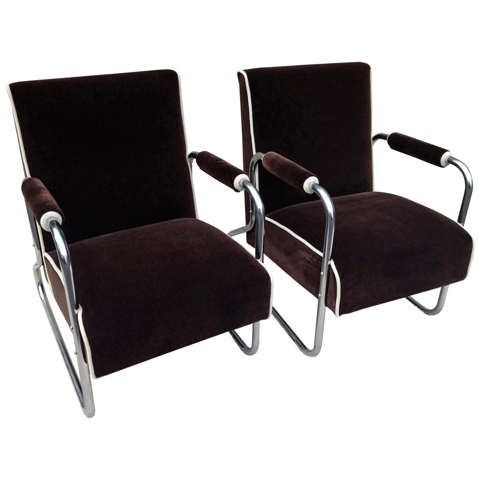 Pair Tubular Chrome Deco Club chairs Attributed Gilbert Rhode