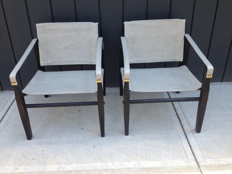 Pair of 1950s grey leather black wooden frame Goldmedal Folding chair Co Club chairs, in the style and period of Kare Klimt design.
