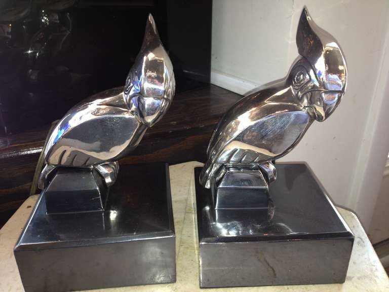 Pair art deco Silver Finish Frankart co Parrot Book ends 1930's
with gun metal bases