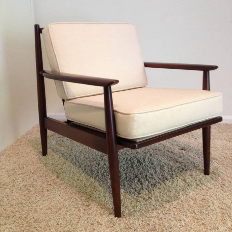 Danish Modern Selig dark walnut arm chair,new Ulpholstery , and retired finish.This chair has a slatted angled back for comfort.and matches a sofa in separate listing.