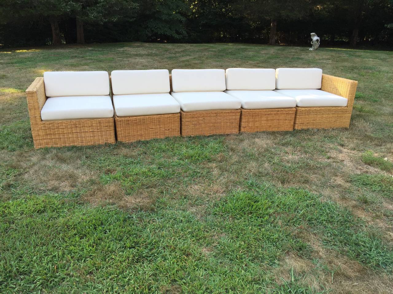 Michael Taylor five-piece wicker/rattan weaved vintage sectional sofa and chairs. Multi-function and set up, also in another listing two club chairs from the same estate, sizes are corner pieces 33''x 29 wide 26'' high back and 17'' seat height,