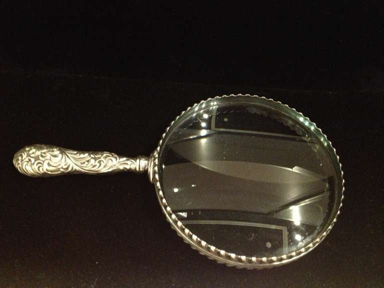 Circa 1890's Tiffany and co Marked {E P} heavy Glass hand Magnifier ,The Magnifier is 8.25 long the glass top 5'' circle and 3/4 inch deep