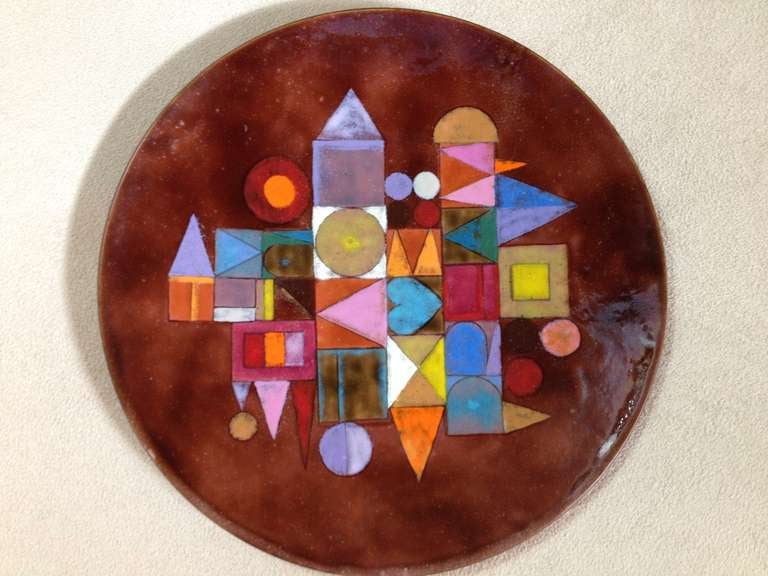 Circa 1961Rare Enameled plate titled (love trust wisdom Unity)By the Most unique San Diego enamellist.,she achieved National recognition for her work during the ,50's-the 70's ,studied at RISD and Cambridge school of Art. a scarce glowing plate,in