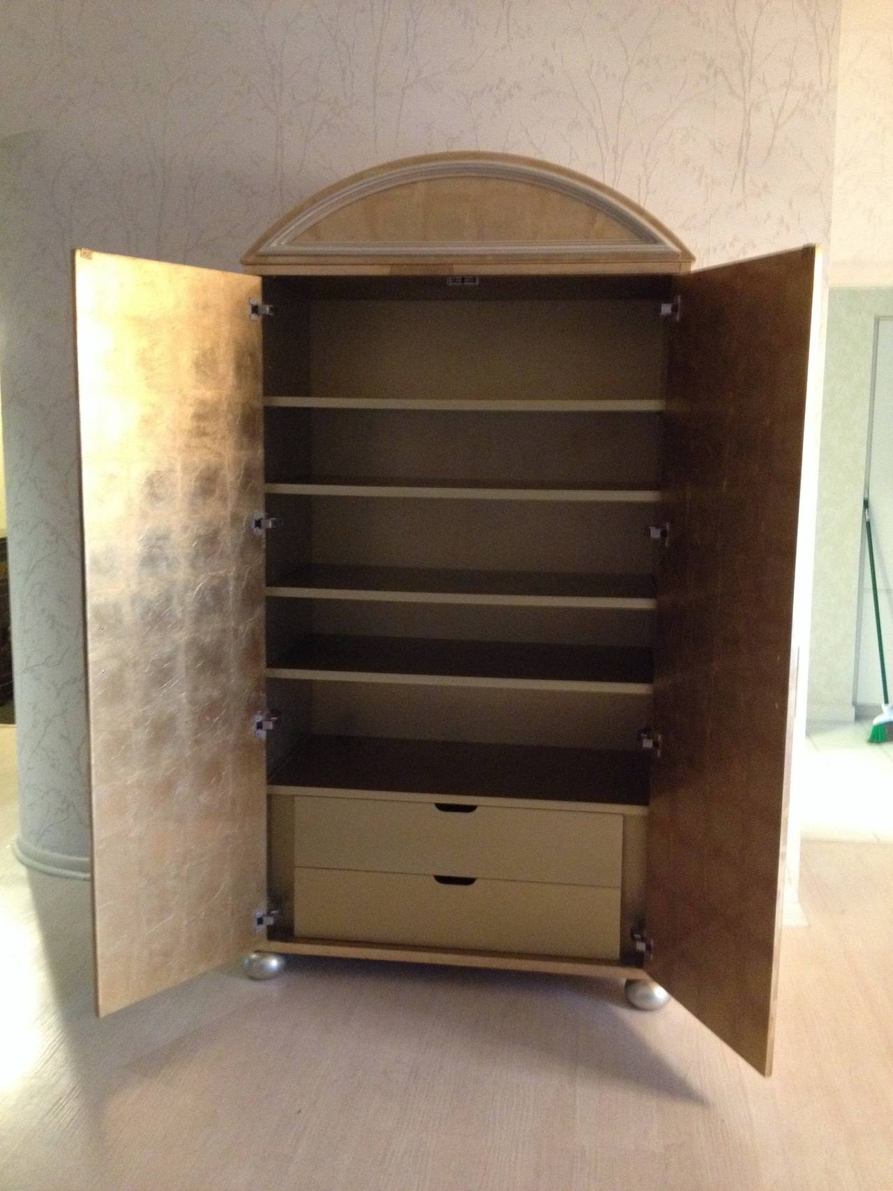 Hollywood Regency Gold and Silver Leaf Cabinet In Excellent Condition For Sale In Westport, CT