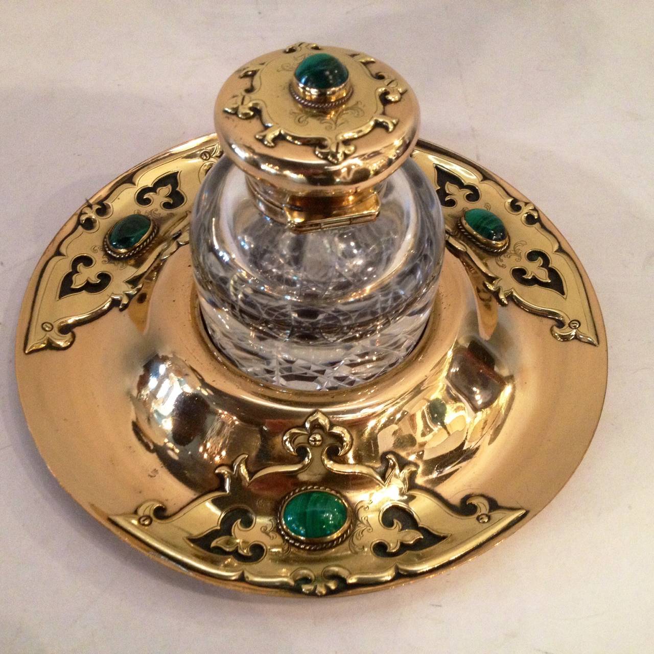 Rare and unusual Art Nouveau brass crystal malachite decorated inkwell with circular base.