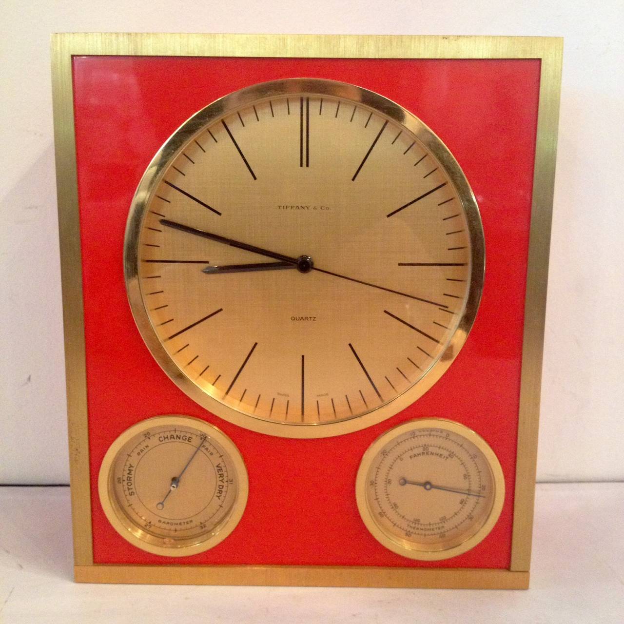 Tiffany and Company orange glass and brass clock barometer, thermometer, rare. Mid-Century design.