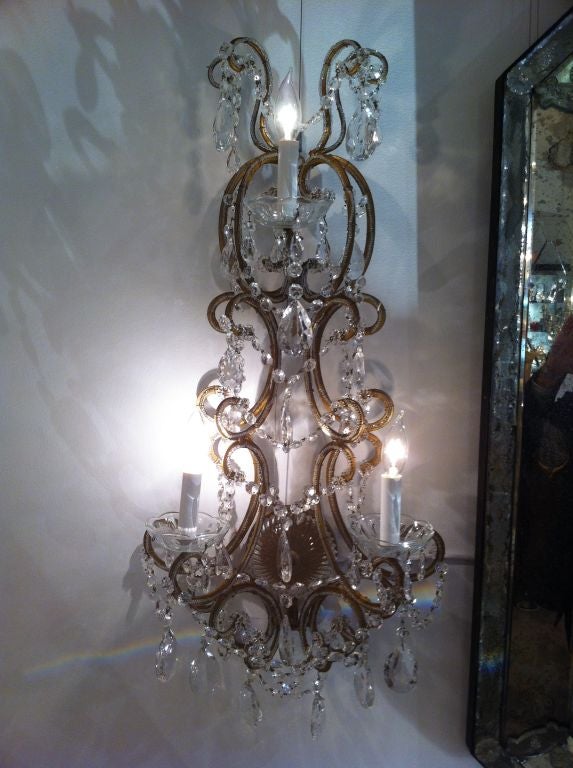 Due coppie di appliques in cristallo francese, 1930 circa.