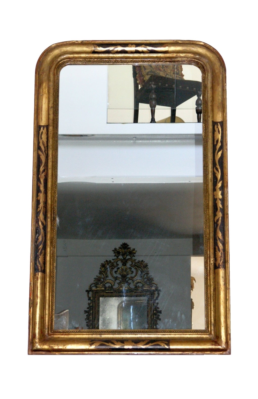 19th century Louis Philippe parcel painted and giltwood wall mirror with flanking rounded corners, floral etched motif.