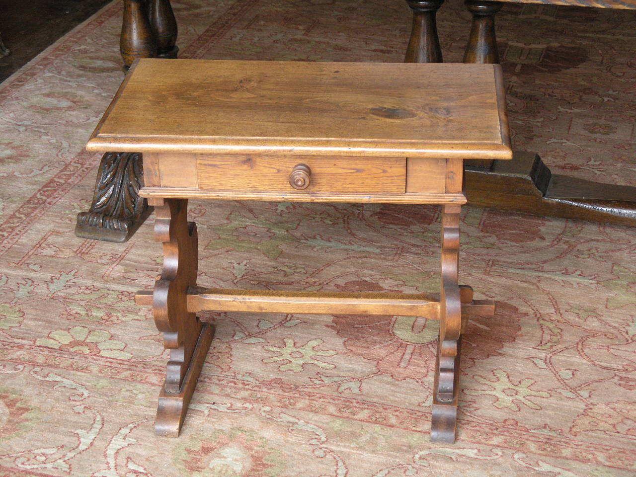 19th century Tuscan Baroque occasional table, walnut wood, carved legs, wooden cross stretcher single draw.