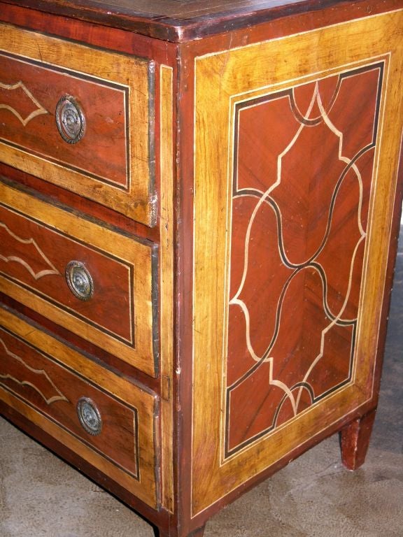 Northern Italian chest of drawers, the rectangular top above three drawers with original hardware raised on square tapered legs