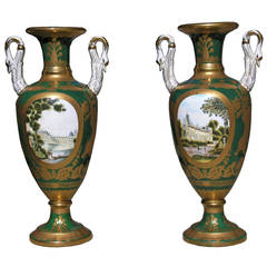 Pair of Glazed and Biscuit Porcelain Urns