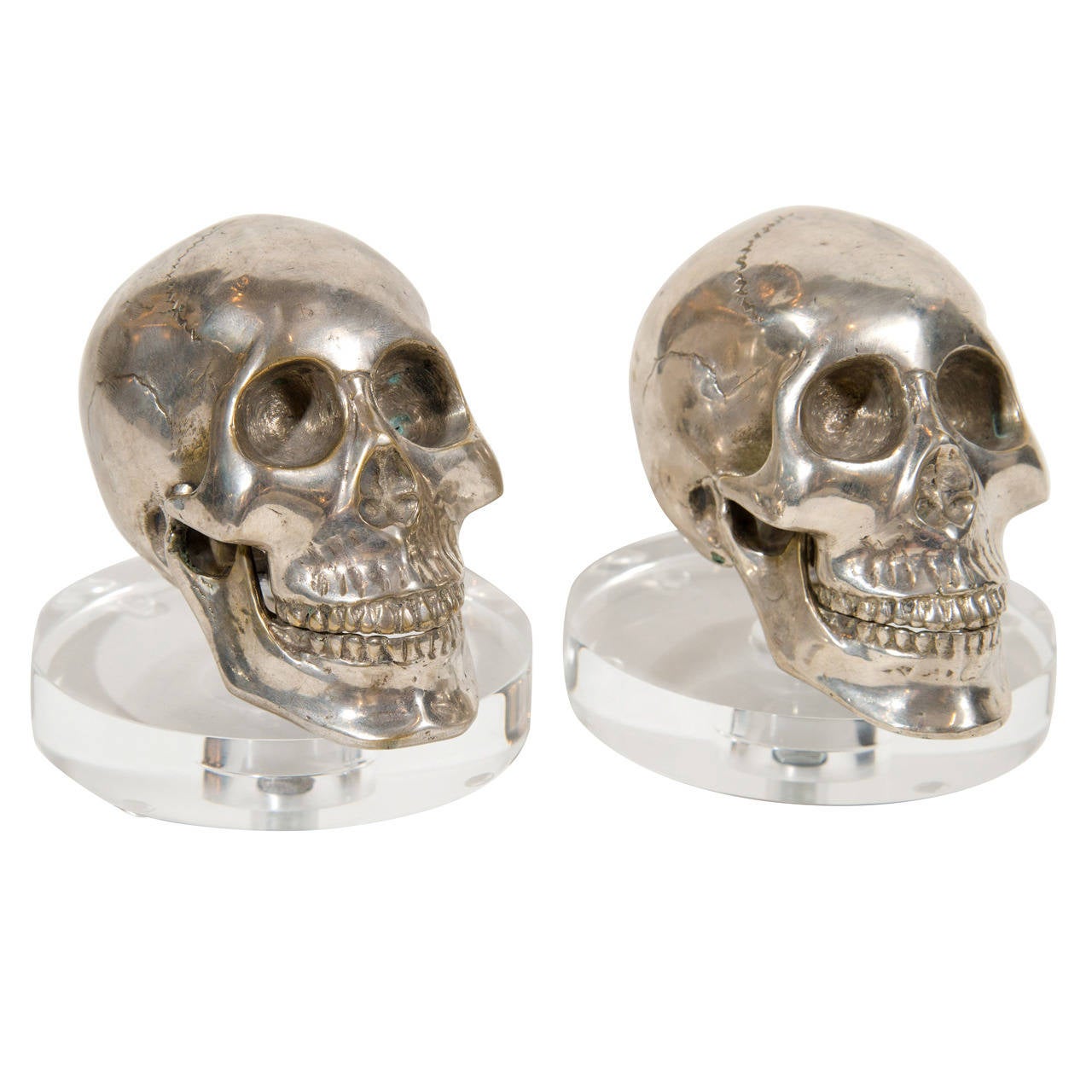 Pair of Hand Forged Silvered Metal and Lucite Skull Bookends