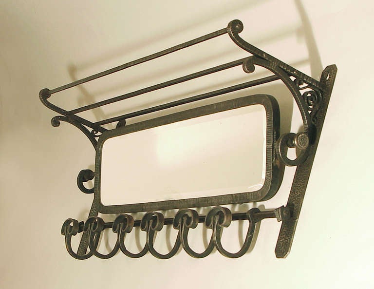 This is the most substantial and best-designed and executed hand-wrought iron coat rack that I've ever seen in my mere 25 years of buying in France. Truth be known, I've had it for a while, but I've never before now even shown it to anyone (yes, I'm