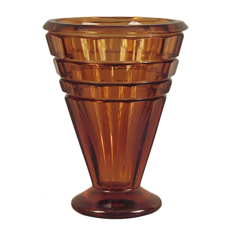 Looking (or holding) this exquisite chunk o' glass, one isn't hard-pressed to see the connection between Moser and Josef Hoffmann, many of whose designs were realized by the former.  This vase weighs almost seven pounds and has 