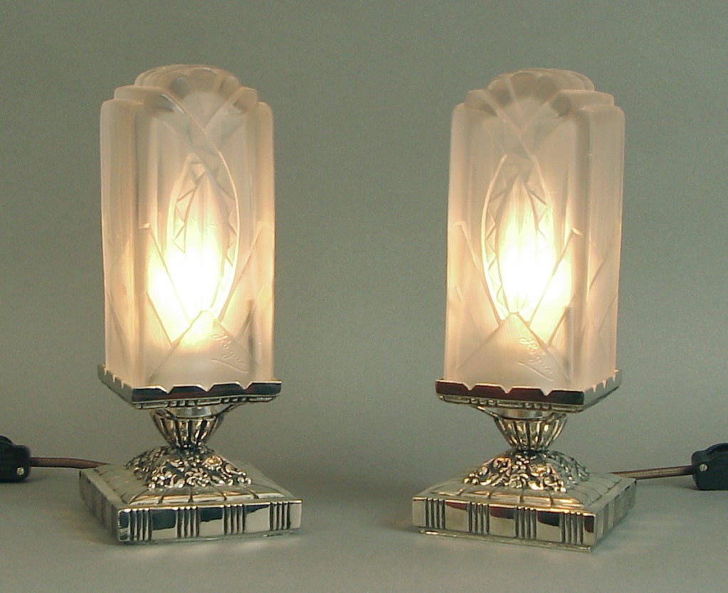 Hugue, one of France's premier Art Deco lighting fabricators/designers, made a chandelier which sported these -- frankly, unbelievable -- shades.  I once had a Hugue chandelier that had SEVEN of these shades on it, if you can imagine!  I was lucky