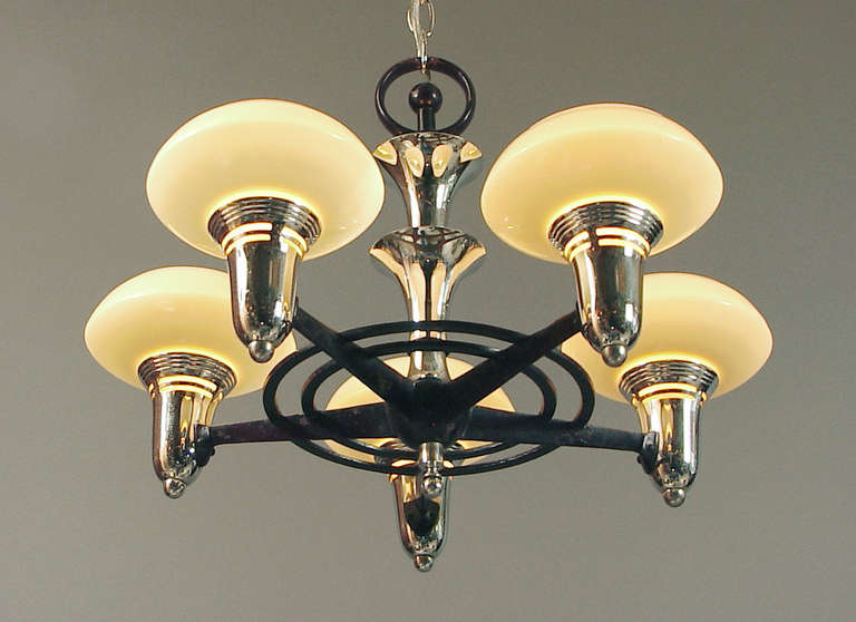 This one lives near the top of the American Art Deco food chain, with its totally cool flaring center pieces and Czechoslovakian (marked) shades!  The configuration is neat and trim, bold and beautifully balanced.  The metal has its original deep