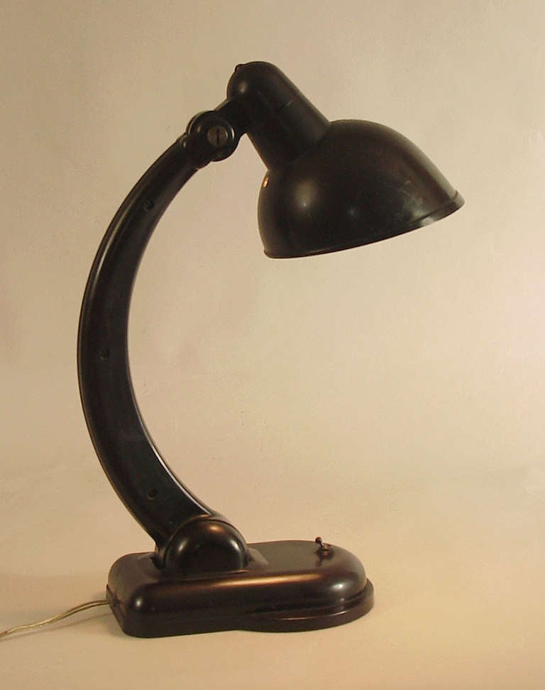 This would be about the coolest design I've seen in French Art Deco all-bakelite lamps.  As you can see it's very flexible, the shade swiveling wherever and the stem at the base moving along the entire continuum.  

Probably best not to exceed 60