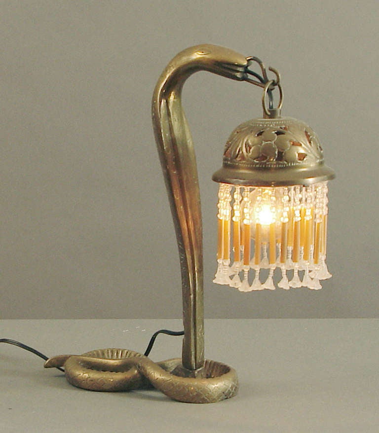 Syrians made a full compliment of brass lamps which were decorated by hand and ornamented with glass beaded shades, and sold all over the world.  Over the years I've had table lamps and floor lamps; they're always beautifully designed and executed,