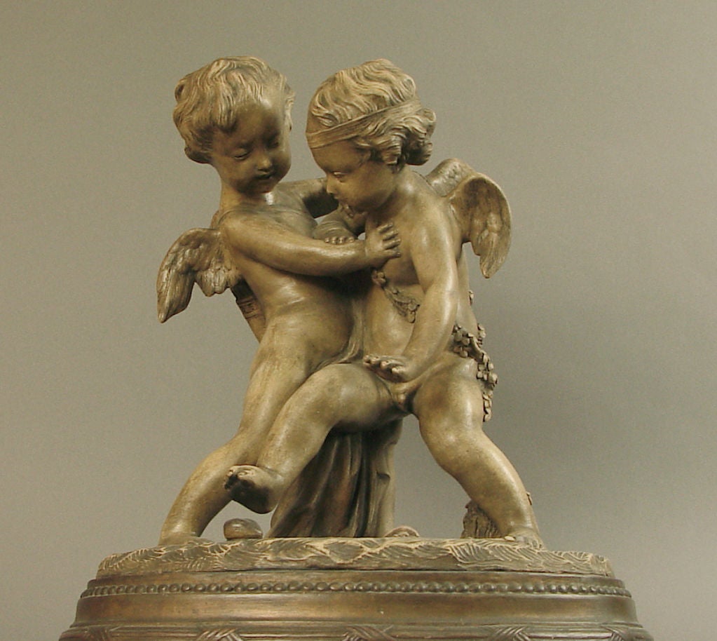 20th Century French Terra Cotta Statue of Cupids/Putti Tussling over a Heart For Sale