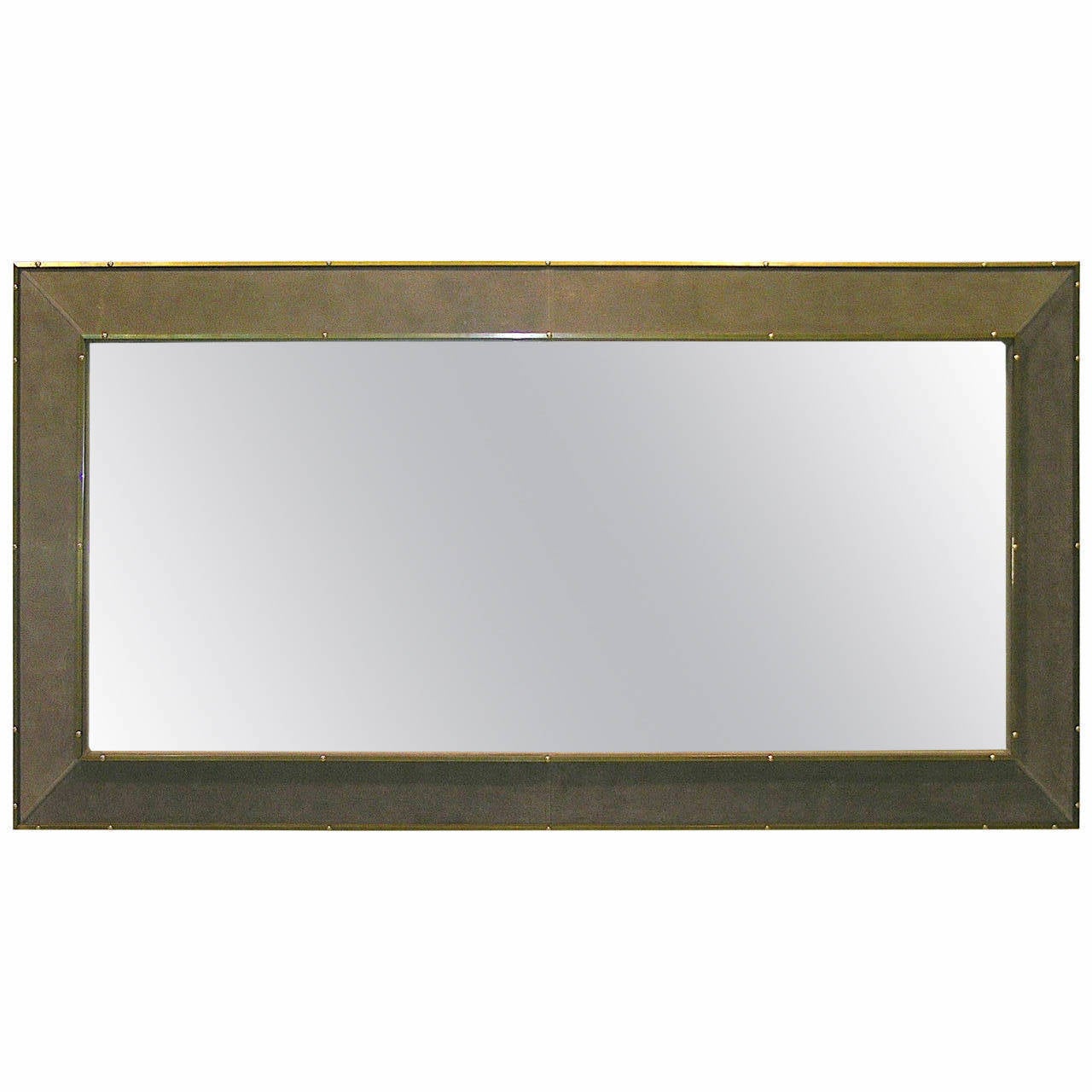 1970s one of a kind Italian floor mirror by Smania covered in an original warm grey suede customized for the previous owner with handcrafted bronze edging decorated with studs. Great design for the projecting frame, high quality of craftsmanship and