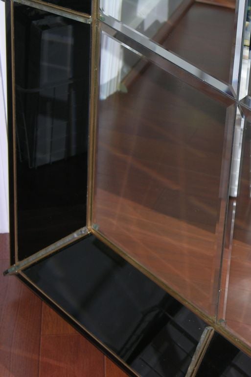 amazing oversized black glass and brass Venetian mirror 1
