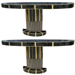 Astonishing pair of Italian black consoles with ivory glass rods