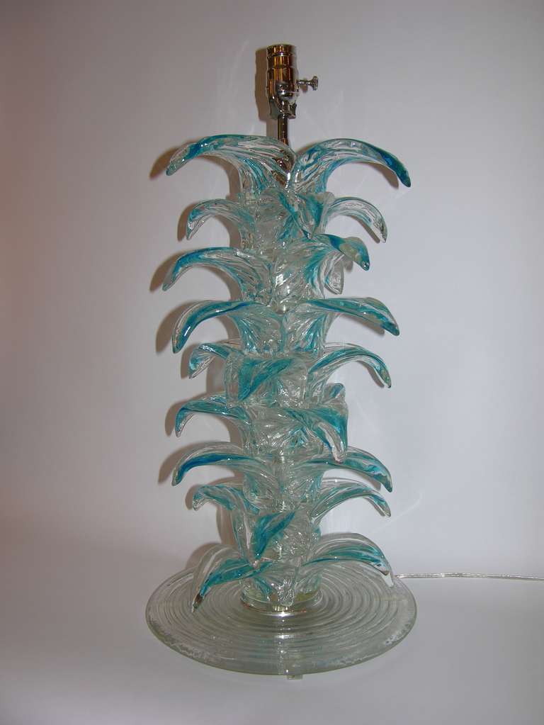 Pair of 1970s very decorative Italian lamps shaped as palm trees. Custom-made with handcrafted textured Murano glass elements. Tips accented with shades of aqua blue on round ribbed glass bases. Every piece is individually mouth blown and unique.