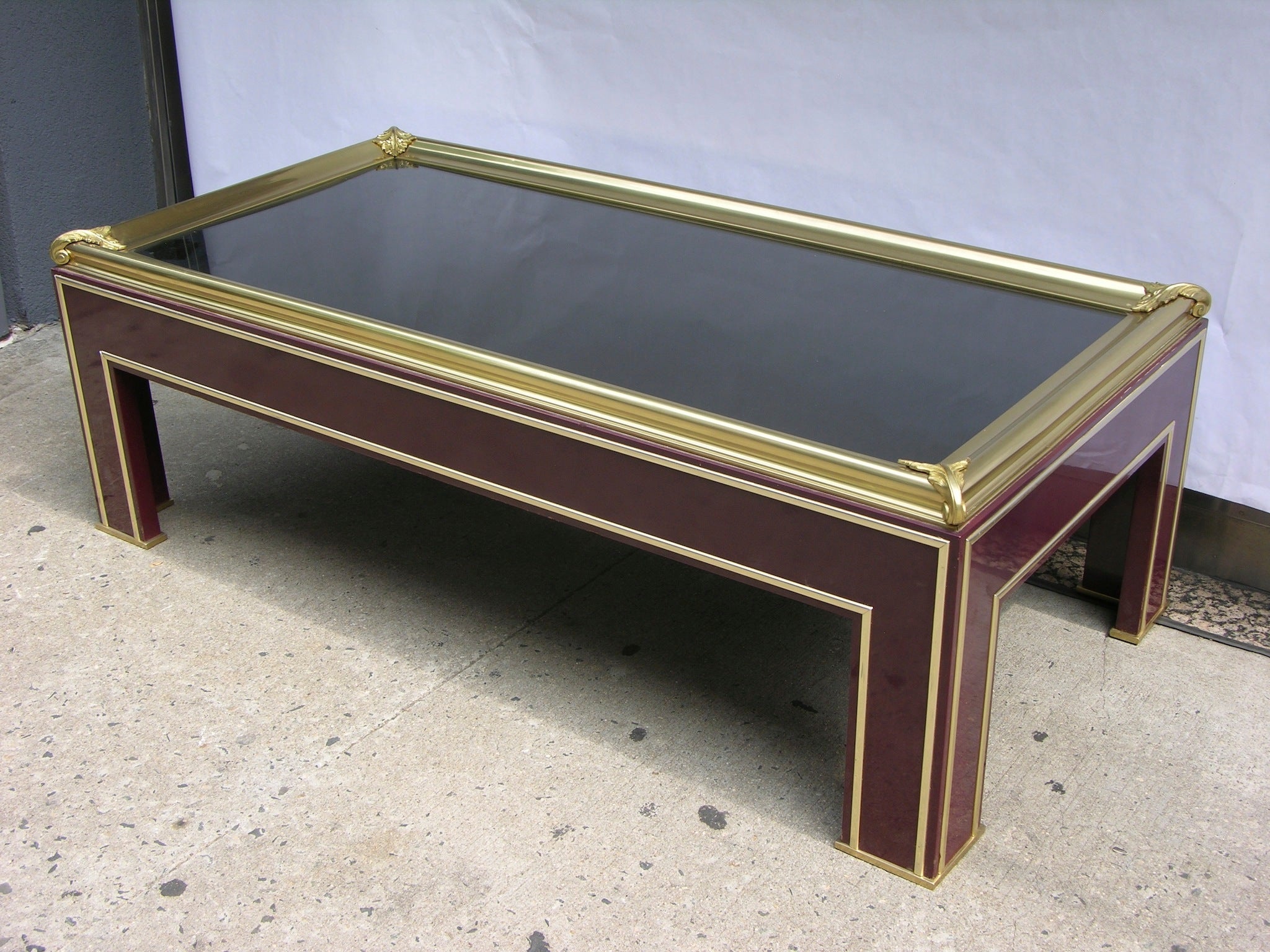 1950s Jansen Coffee Table with Brass Frame on Burgundy Lacquer Base