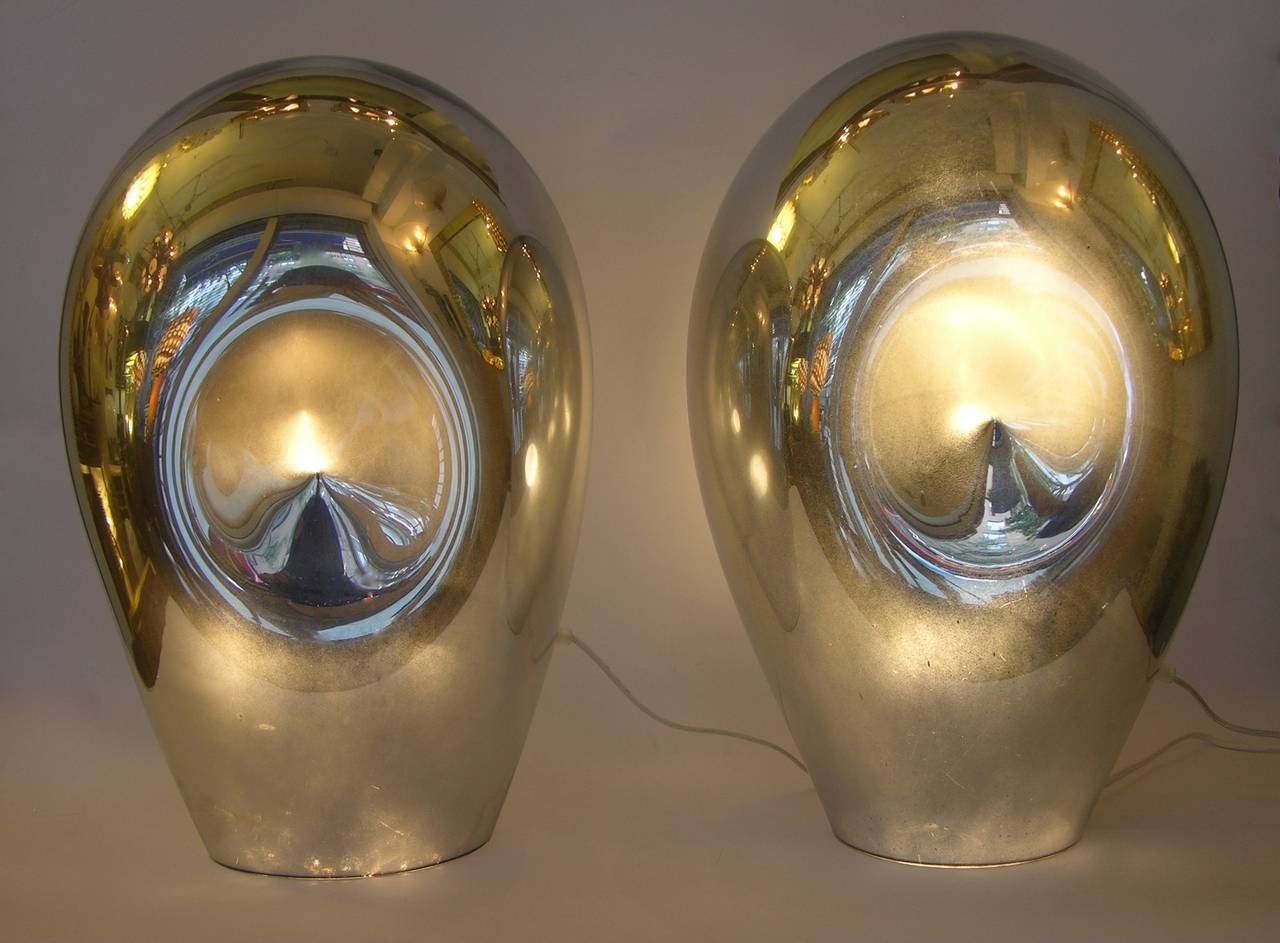 Bring an extraterrestrial atmospheric mood into your home with this abstract pair of mouth-blown lamps, a 1970s organic serene creation by Vincenzo Nason, the mirrored Murano glass is decorated in fusion with silver that makes these lamps a precious