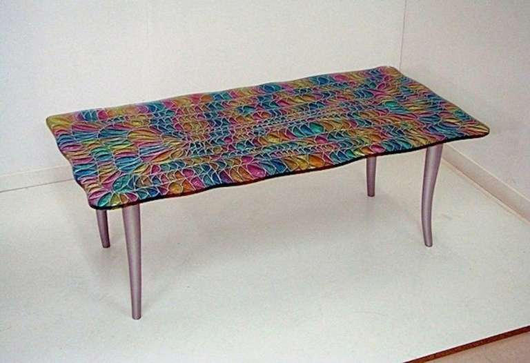 This is a very rare and exceptional museum piece of vintage Italian design, coffee table designed by Eugenio Davico for Studio Davico, multicolored crystal top with free-form edge, hand decorated with a deep acid engraving, on a silver lacquered