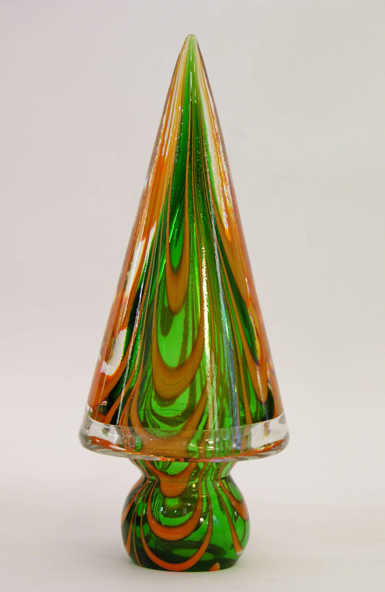 These colorful Christmas Trees are each individually blown and a creation by the Venetian company Formia, in mouth blown Murano Glass. Some are worked with pure gold, some with inclamo and silver speckles, with colored swirls in the glass. With